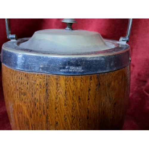 182 - A vintage wooden biscuit barrel.