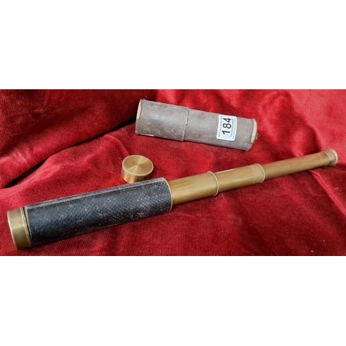 184 - An antique 3 drawer telescope, with no visible makers mark, in original card tube. Measures 51cm whe... 