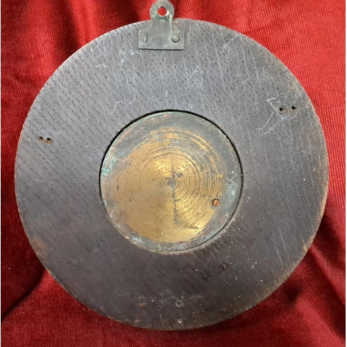 185 - An antique wood cased barometer, measuring 23cm wide.