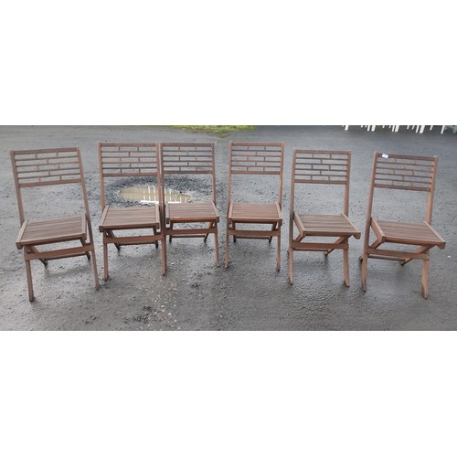 473 - A set of six folding garden chairs.