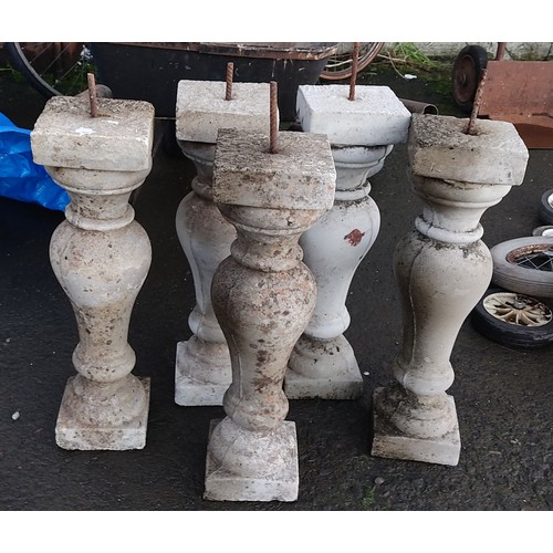 476 - A set of 5 concrete / stone balustrades. measuring 53cm tall.