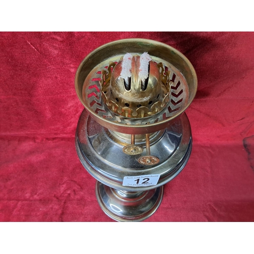 12 - A brass oil lamp base.