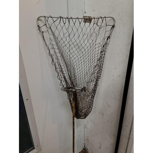 16 - A vintage landing net.