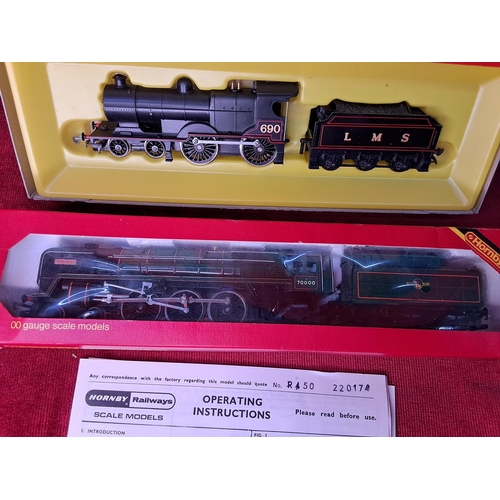 30 - A boxed Hornby Railways R063 BR Loco Britannia and a Hornby Railways R450 LMS 4-4-0 Class 2P Fowler ... 