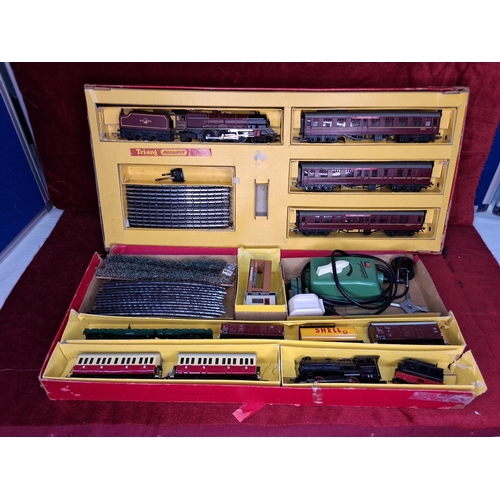 31 - A vintage boxed Fleischmann Batt. 2 GP train set and a vintage boxed Tri-ang Railways Electric Model... 