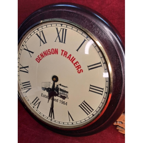 35 - A Dennison Trailers circular wall clock and another.