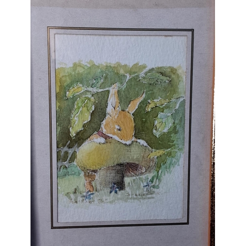 58 - A framed watercolour of a Field Mouse, signed, measuring 17cm x 22cm.