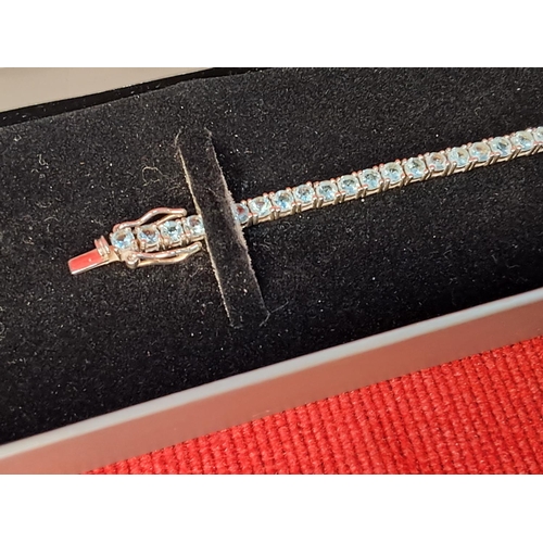 67 - An Argento Sterling silver light blue stone bracelet.