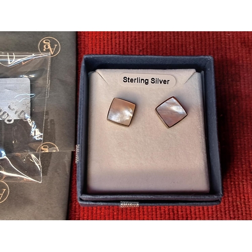 68 - A pair of Argento Sterling silver earrings and another.