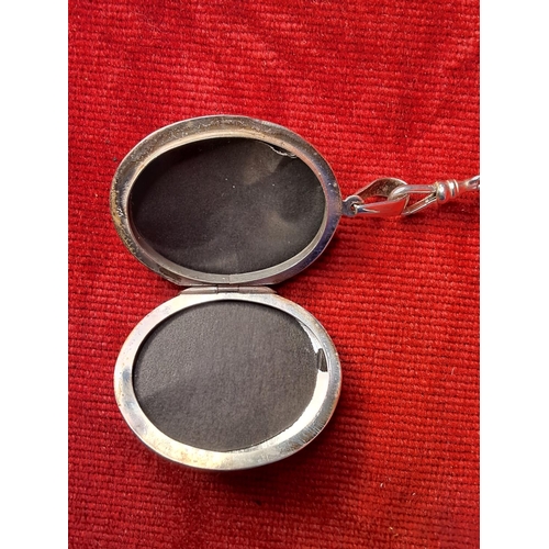 76 - A stunning sterling silver locket and chain. weighing 63.7 grams.