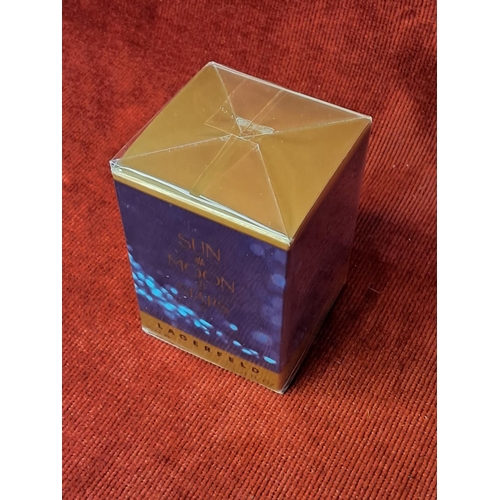 77 - An unopened box of Lagerfeld 'Sun Moon and Stars' perfume.