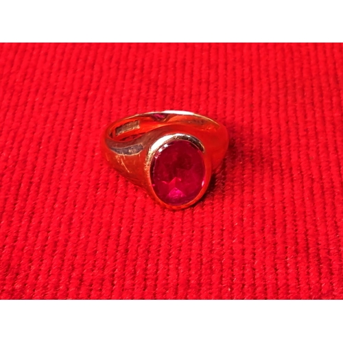 79 - A vintage Gent's 9ct gold signet ring set with large Garnet, size S/T.