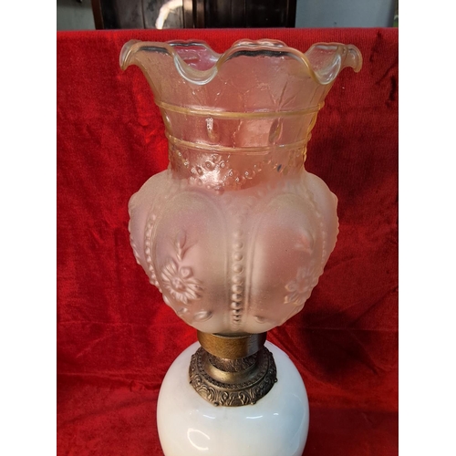 8 - A vintage 'Danish' style table lamp in the style of an oil lamp. Measuring 60cm tall.