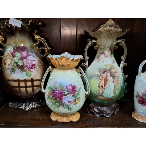 A collection of 4 large antique vases.