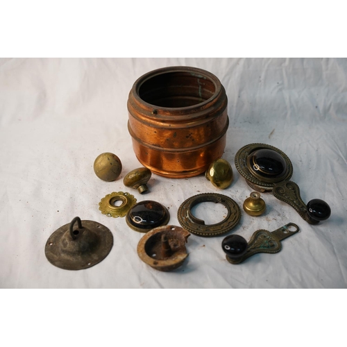 664 - A vintage copper lacquered pot, an antique cast iron black and gold porcelain window winder and more... 