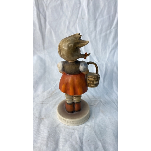 650 - A Goebel Hummel 'Little Shopper' figure.