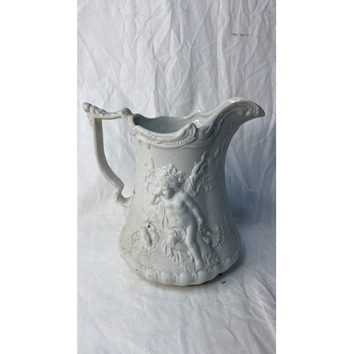 653 - A large Portmeirion Parian ware pitcher/jug.