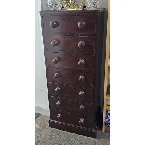 1 - An antique wooden chest of 7 drawers, measuring 15