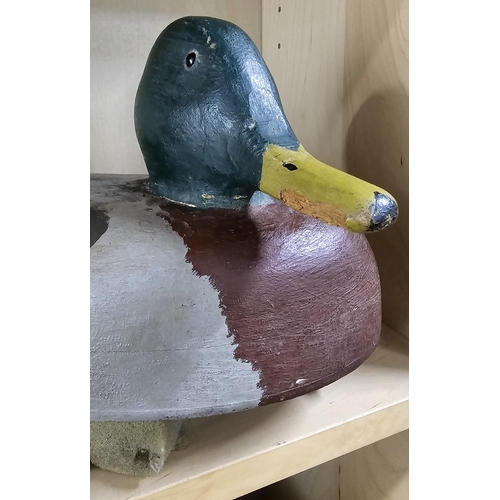 11 - A stunning handmade wooden duck decoy, with hand painted effect, measuring 39cm long.