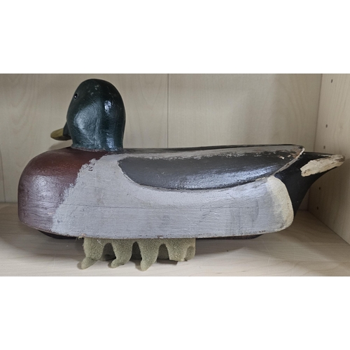 11 - A stunning handmade wooden duck decoy, with hand painted effect, measuring 39cm long.