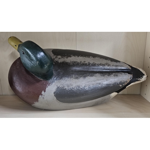 11 - A stunning handmade wooden duck decoy, with hand painted effect, measuring 39cm long.