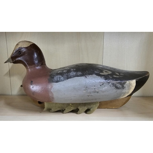 12 - A stunning handmade wooden duck decoy, with hand painted effect & damaged beak, measuring 33cm long.