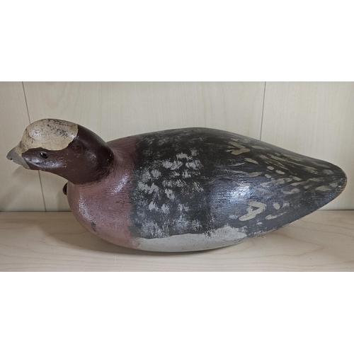 12 - A stunning handmade wooden duck decoy, with hand painted effect & damaged beak, measuring 33cm long.