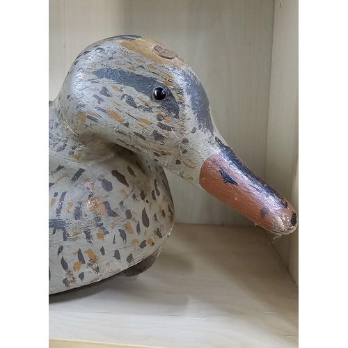 14 - A stunning handmade wooden duck decoy, with hand painted effect, measuring 47cm long.