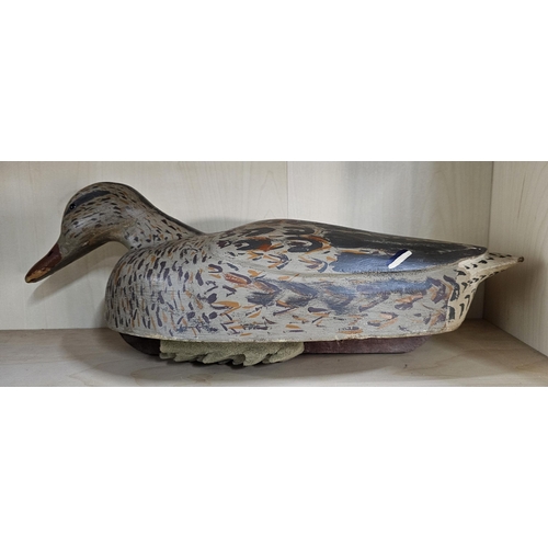 14 - A stunning handmade wooden duck decoy, with hand painted effect, measuring 47cm long.