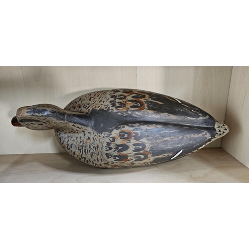 14 - A stunning handmade wooden duck decoy, with hand painted effect, measuring 47cm long.