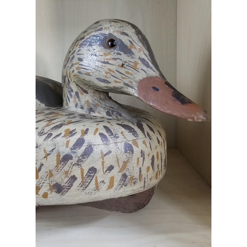 15 - A stunning handmade wooden duck decoy, with hand painted effect, measuring 38cm long.