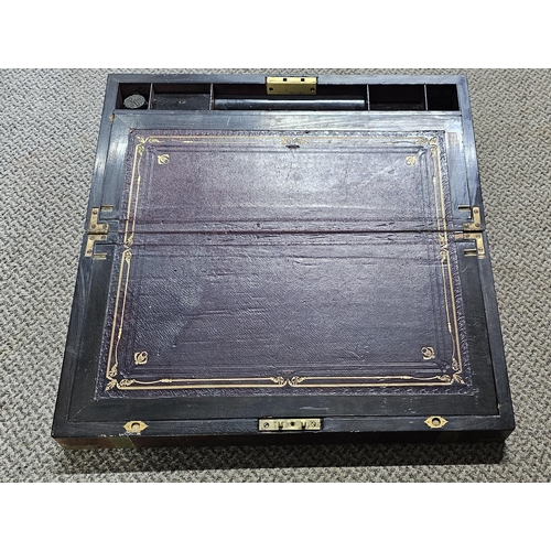 18 - A stunning large antique brass bound writing slope measuring 26cm x 55cm x 19cm.