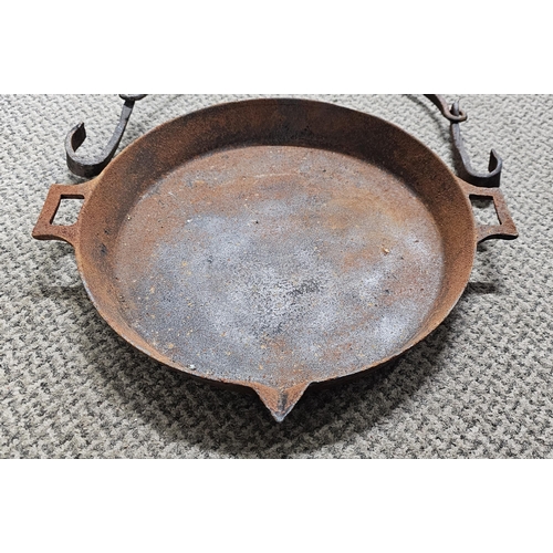 19 - An antique cast iron Irish 'Swain' pan with original wrought iron hanger, with Shamrock makers mark ... 