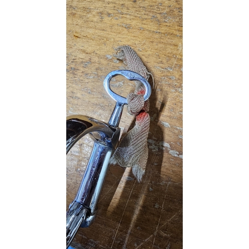 30 - A set of original Royal Irish Constabulary (RIC) 'Irish Eight' handcuffs with key, stamped 'HIATT'