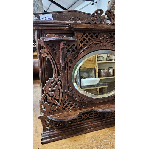 32 - A stunning & unusual antique apprentice piece over mantle mirror, measuring 33cm x 36cm.