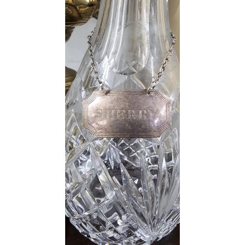 4 - A crystal decanter with silver plated 'Sherry' decanter tag/ label.