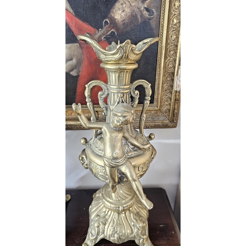 5 - A stunning set of large vintage brass candlesticks, with cherub design, each measuring 40cm tall.