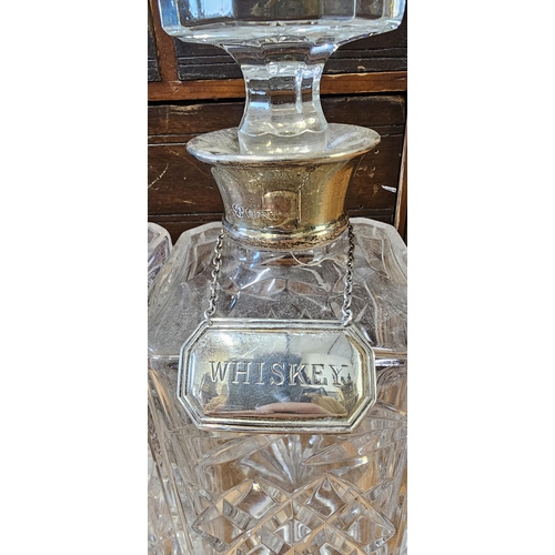 51 - A stunning pair of antique cut glass decanters, each with Sterling Silver collar & Sterling Silver d... 