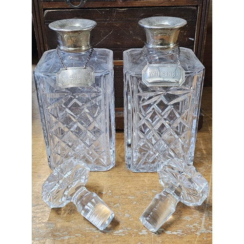 51 - A stunning pair of antique cut glass decanters, each with Sterling Silver collar & Sterling Silver d... 