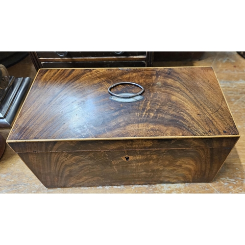 65 - A stunning antique/ Victorian Flame Mahogany tea caddy, measuring 12