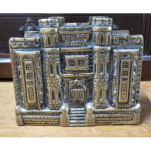 66 - A vintage cast brass 'County Bank' money box.