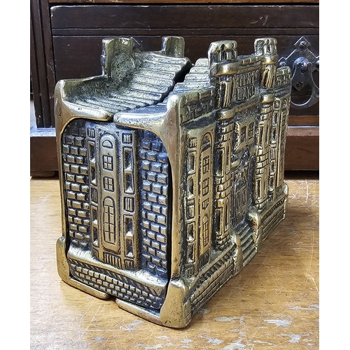 66 - A vintage cast brass 'County Bank' money box.