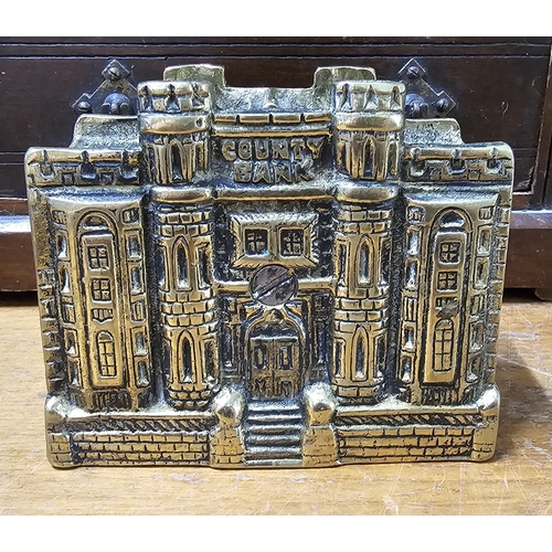 66 - A vintage cast brass 'County Bank' money box.