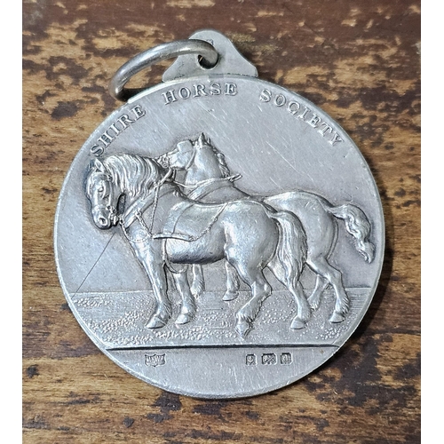 71 - A stunning antique Sterling Silver 'Shire Horse Society' medal, produced by Mappin & Webb, fully hal... 