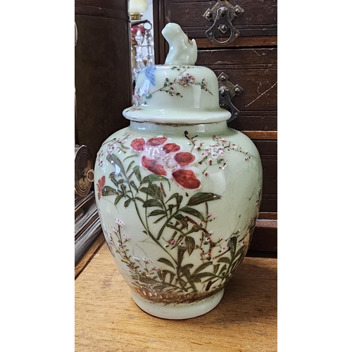 75 - A stunning pair of antique Chinese ginger jars with hand painted floral designs, measuring 22cm.