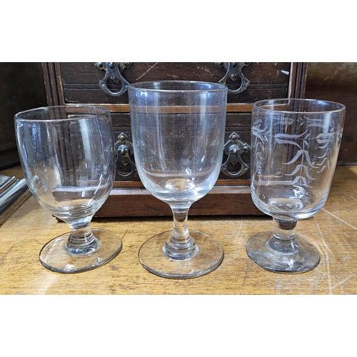 78 - A collection of 6 antique hand blown 'Rummer' glasses of various sizes, to include a decorative etch... 