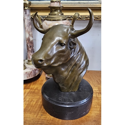 91 - A cast metal bull bust, signed Milo to rear, 22.5cm .