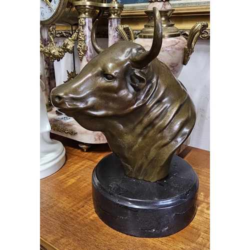 91 - A cast metal bull bust, signed Milo to rear, 22.5cm .