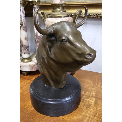 91 - A cast metal bull bust, signed Milo to rear, 22.5cm .