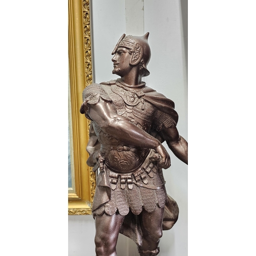 92 - A large antique/ vintage spelter figure of a Roman soldier, measuring 57cm tall.